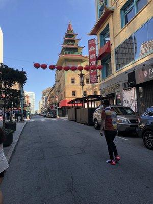 And a picture of the a Chinese-like tower near the entrance to China  Town, looking back up the street.