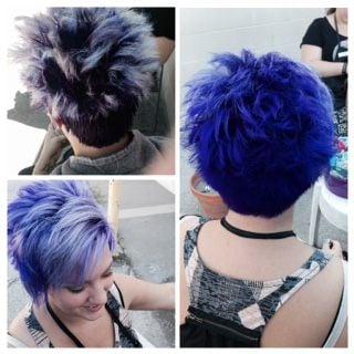 Electric blue pixie cut with powder splashes by Amanda. We call this look, "Rocker chic."