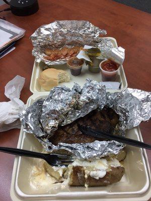 12oz ribeye, baked potato, shrimp