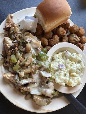 Marinated Smothered Chicken all the way (Swiss cheese, mushrooms, green peppers and onions) with Potato Salad, Fried Okra and a roll.