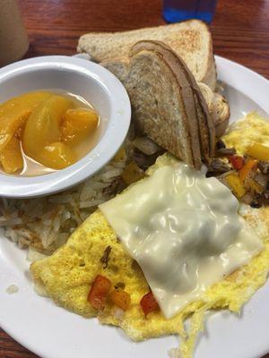 The Philly Omelette with hash browns, side of toast and fruit.