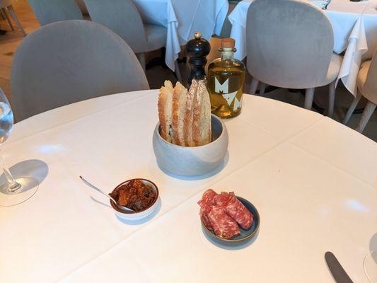 Complimentary bread, eggplant and soppressata