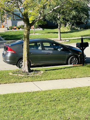 Car blocking my mailbox. I don't know whose car it is