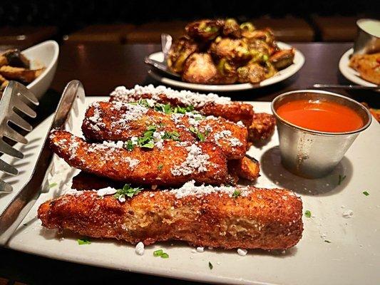 Eggplant Fries are a surprise with the powdered sugar and hot sauce. Intriguing.