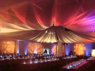 Ivory sheer ceiling treatment, creating a true focal point in the large room