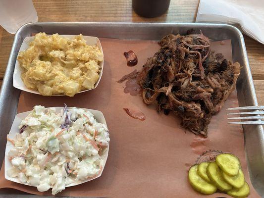 Pulled pork plate-Homemade pickles. This photo does not due justice to the hearty portion. The meat was so flavorful- no sauce needed.