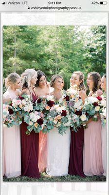 Bride,  bridesmaids and their beautiful bouquets.