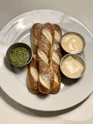 Delicious  warm pretzels  with Gouda cheese