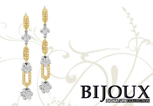 18kt white and yellow gold custom diamond earrings.