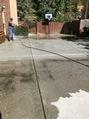 Pressure Washing a Driveway/Patio/and rear exterior of house