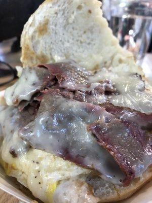 Egg, brisket, cheese and horsey sauce sandwich.