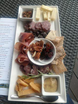 Complementary cheese plate for premium club members when you come for a tasting