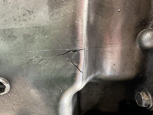 Clean Oil Pan to identify Damage in its entirety