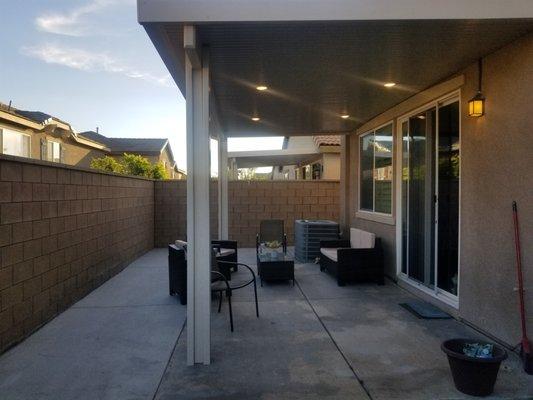 covered patio with 4 can lights.  beautiful patio cover.