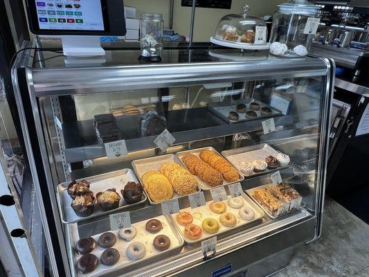 Donuts, muffins, cookies, cupcakes, loaves, oh my! They also had GF Brioche loaves of bread!