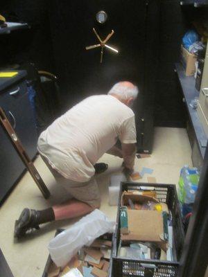 John expertly leveling gun safe.