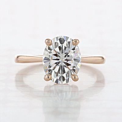 Browse luxuriously warm rose gold engagement ring styles: http://bit.ly/2Byddd7