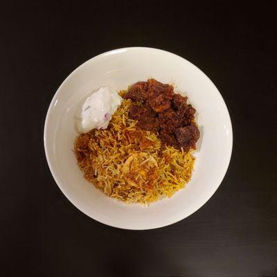 Egg Biryani, Mushroom Pepper Salt, Raita.