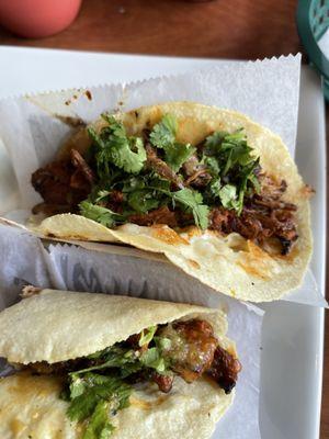 Birria taco and Al pastor taco