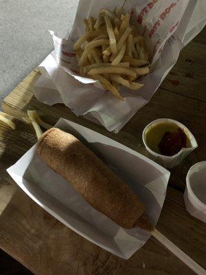 Beef corn dog and fries with ketchup n mustard