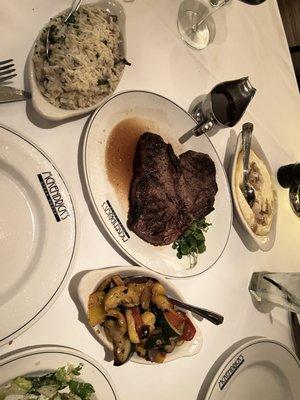 Steak with our sides of mushroom risotto, garlic mashed potatoes and grilled assorted vegetables