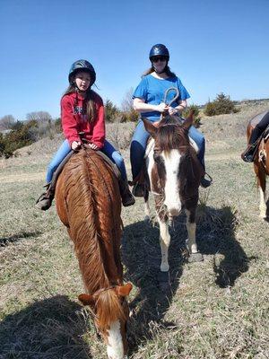 Mom and daughter trail ride