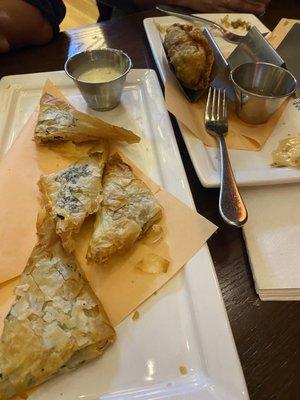 Spinach triangles + jerk chicken egg rolls