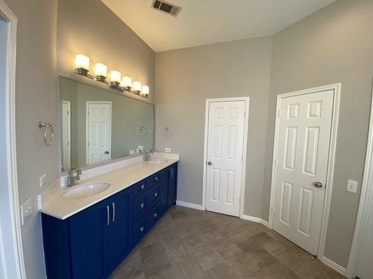 Home Platinum Services transformed a tired bathroom into a luxury space with stylish details, custom fixtures, and a walk-in shower.