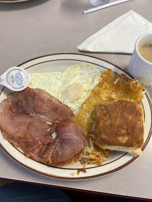 Country ham, eggs over easy,  hash browns, and biscuit