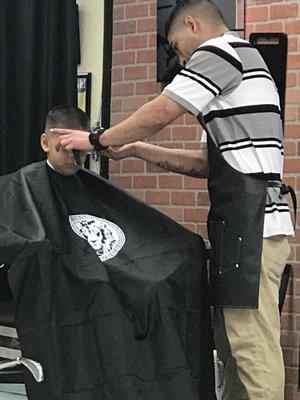 Son getting a haircut