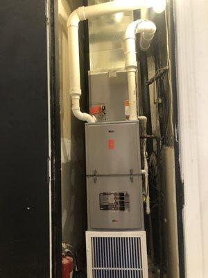 Beautifully installed high efficiency furnace with air conditioning coil. This client recieved a 12 year warranty on her HVAC equipment.