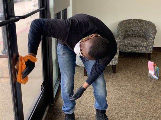 Our Cleaning Technician implementing our Gold Standard Disinfecting Program.