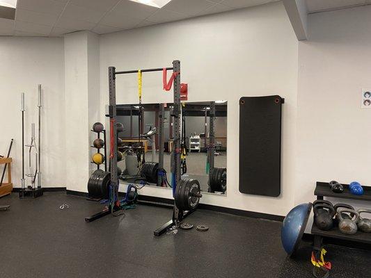 Exercise room with wide variety of equipment.