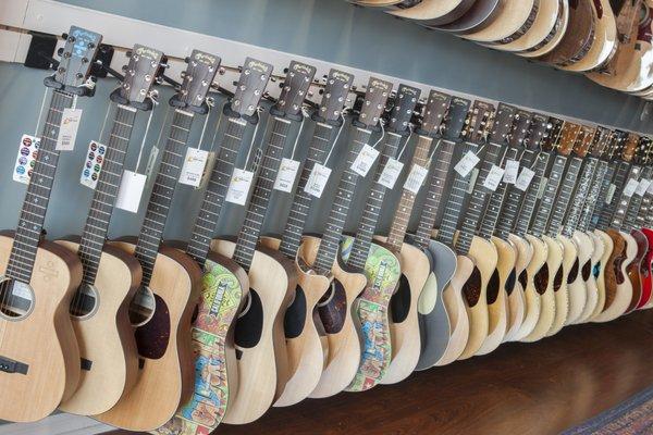 Just a few C.F. Martin acoustic guitars hanging in our showroom!