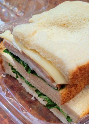 Somewhat sad turkey and swiss sandwich at 9:00pm.  It cost $6.50,  I think? Captive audience.