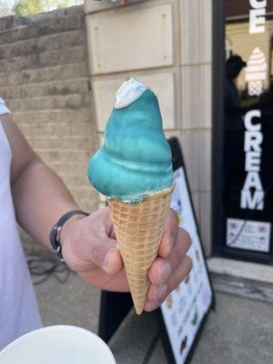 Vanilla and the sugar cone with blue raspberry hard shell