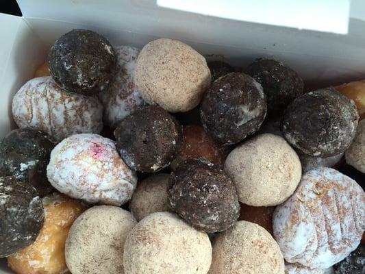 A box full of freshly baked munchkins!!