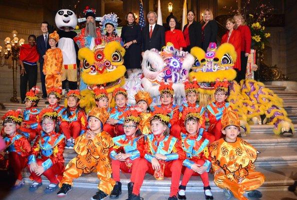 The Chinese New Year Parade team performs at City Hall.