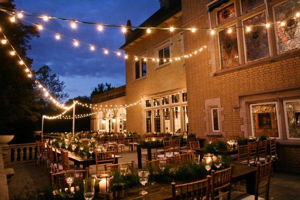 Dinner on the Terrace under twinkling lights.