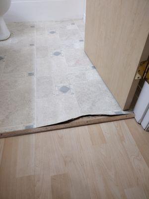 My terrible flooring before Flooring Direct came to install new LVP!