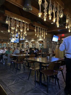 A shop of the restaurant with some of their unusual lighting on ropes