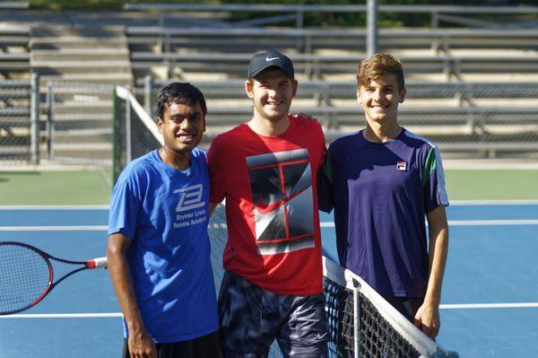 Aditya Gupta and Stefan Dostanic with Jared Donaldson (center).