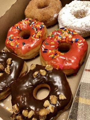 Chocolate walnut, cherry sprinkled, powdered sugar and cinnamon sugar.