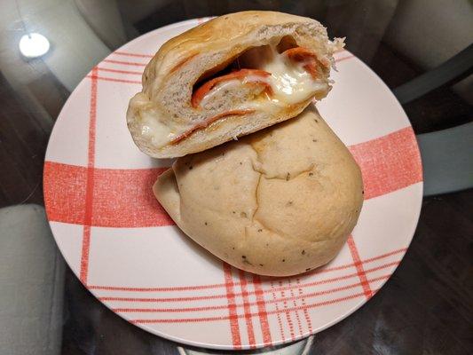 Pepperoni in soft herbed dough with gooey melted cheese. I keep a few of these at home for a quick dinner. So good!