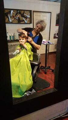 Maria cutting my sons hair! She did an amazing jon