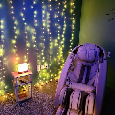 Relax in our zero gravity massage chair.