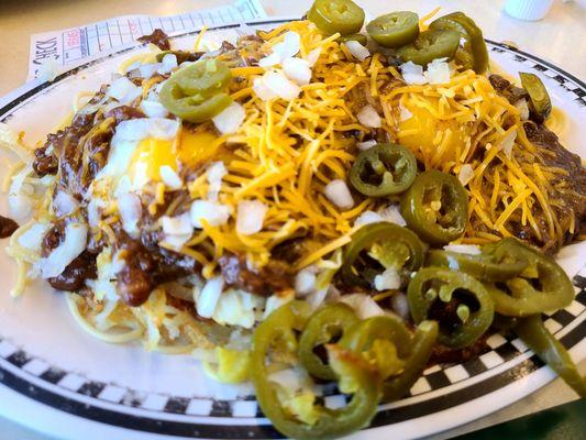 Slinger with eggs over easy - St. Louis tradition. I also had them add spaghetti! Great breakfast!