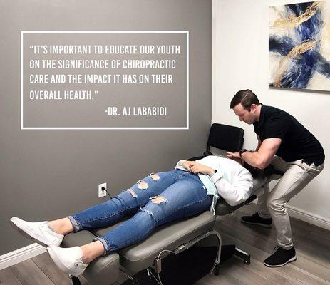 Dr. AJ Lababidi adjusting his patient!