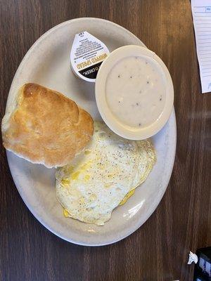 2 fried eggs, biscuit, gravy