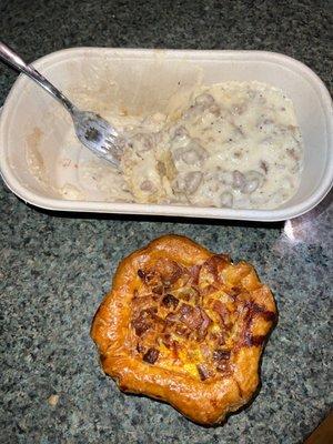 HUGE Biscuit & gravy with a meat lovers quiche.